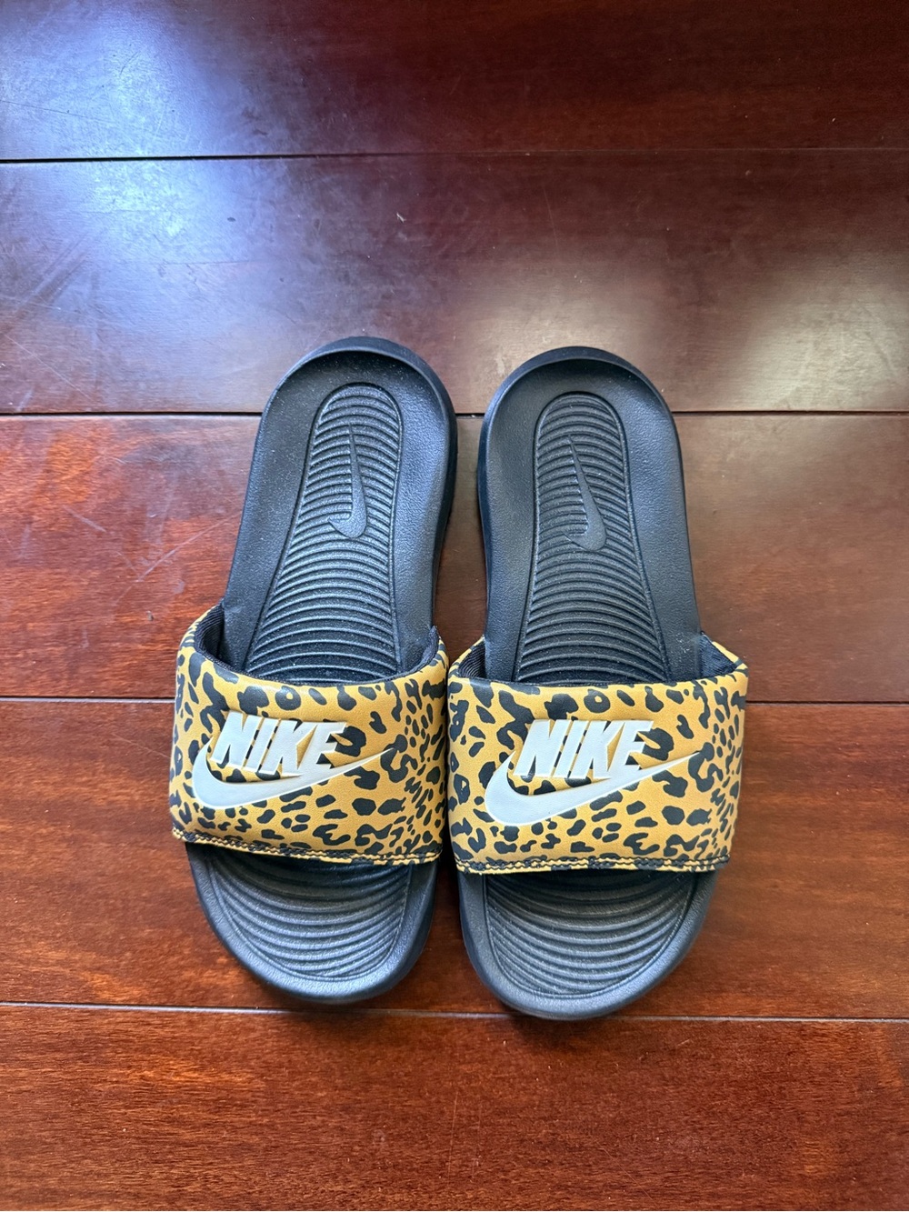 Nike Women’s Leopard-Print Slide Sandals in Black & Tan